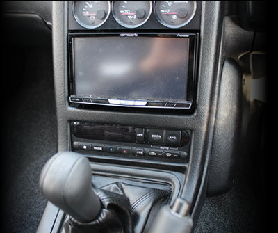 BNR32 2DIN Audio Kit — Carbon, Clear Coat — image 1